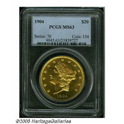1904 $20 MS63 PCGS. This bright, flashy, prooflik