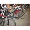 Image 2 : RED AND GREY SUPERCYCLE BIKE AND BLACK RALEIGH BIKE