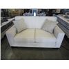 Image 1 : ASHLEY SIGNATURE FLOOR MODEL MODERN OFF WHITE LOVESEAT, RETAIL $1199