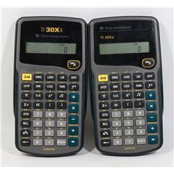 A PAIR OF TEXAS INSTRUMENTS SCIENTIFIC