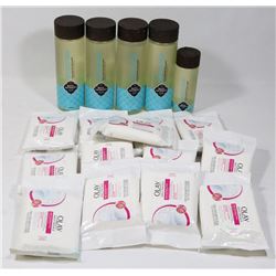 BAG OF SHOWER GEL AND OLAY DAILY FACE WIPES.