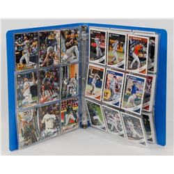 BINDER OF BASEBALL CARDS.