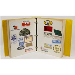 BINDER OF ASSORTED OIL FIELD STICKERS