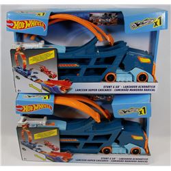 2 HOT WHEELS STUNT AND GO SETS.