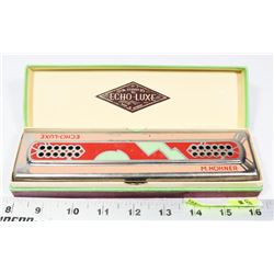 ECHO LUXE HARMONICA MADE IN GERMANY.