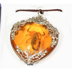 AMBER COLOR PENDANT WITH SCORPION INSIDE