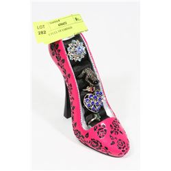 SHOE FULL OF EARRINGS