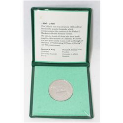 1906-1986 MACKENZIE HEALTH SERVICE CENTER COIN.