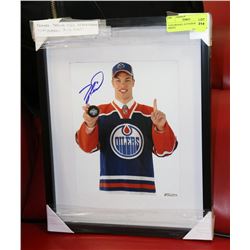 TAYLOR HALL AUTOGRAPHED PHOTO.