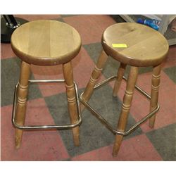 PAIR OF ROUND WOOD STOOLS.