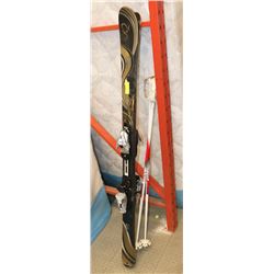 PAIR OF HOT LUO BIOFLEX CORE SKIS WITH POLES.