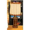 Image 1 : AMBER HOUR GLASS STYLE LAMP.