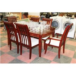 DINING TABLE WITH 6 CHAIRS AND LEAF.