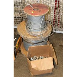 2 ROLLS OF STEEL CABLE WITH CLAMPS.