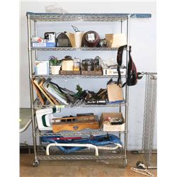 RACK OF MISC HOUSEHOLD ITEMS.