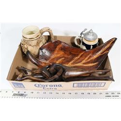 FLAT OF ESTATE SIGNS AND WOOD CARVINGS.