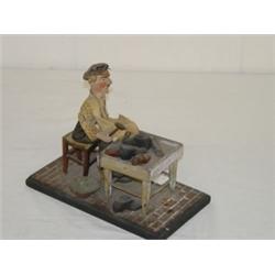 EARLY 20TH CENT. CARVED WOODEN FIGURE OF COBBLER