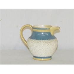 SMALL YELLOWARE CREAMER W/ SAND FINISH