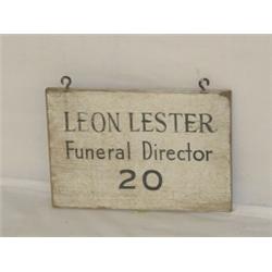 10 1/2" PAINTED TRADE SIGN - LEON LESTER FUNERAL DIRECTOR 20
