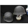 Image 1 : Two vintage military helmets including one with German Eagle Swastika litho