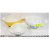 Image 1 : THREE VINTAGE PYREX BOWLS.