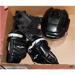 BOX OF USED YOUTH HOCKEY EQUIPMENT