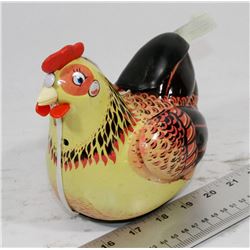 VINTAGE TIN LITHO HEN LAYING EGGS.