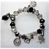 Image 1 : 24)  BLACK, CLEAR CRYSTAL & SILVER