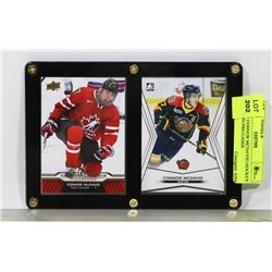 PAIR OF CONNOR MCDAVID HOCKEY CARDS IN PRO CASES