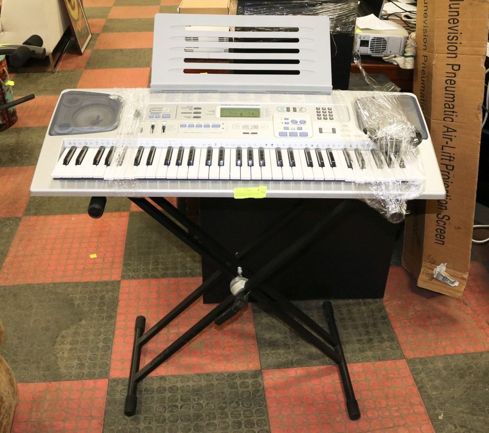 CASIO KEYBOARD WITH STAND AND BENCH MODEL CTK591