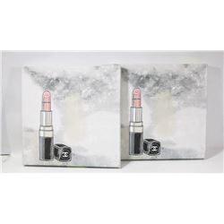 PAIR OF CHANEL THEMED CANVAS PRINTS.
