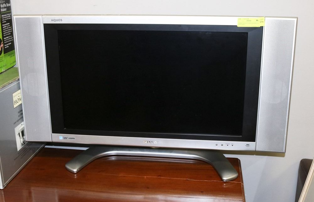 SHARP AQUOS TV WITH REMOTE 26" ON STAND