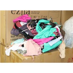 STACK OF NEW LADIES CLOTHING