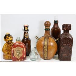 FLAT OF ASSORTED GLASS & LEATHER COVERED BOTTLES.