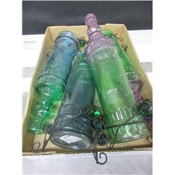 4 Colored hanging Bottles / all have 19.99 tags / think they are Hummingbird