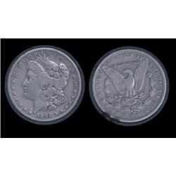 1892s Morgan Dollar in airtite. VF+. Key.