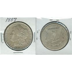 1887 MORGAN SILVER DOLLAR.