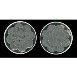 Tempe AZ Vienna Bakery 1 loaf bread token; Birt R-5 Nice condition for this scarce piece, rotated di