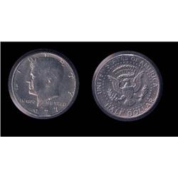 1977-D Kennedy Half w/clip; Unusual on coin this size!