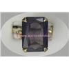 Image 1 : 10 K YELLOW GOLD LADIES GEMSTONE RING SET WITH AN EMERALD CUT AMETHYST STONE 11 X 15 MM. 8.7 GRAMS.