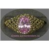 Image 1 : 14 K YELLOW GOLD LADIES GEMSTONE RING SET WITH AN OVAL CUBIC ZIRCONIA PINK STONE. 3.1 GRAMS.