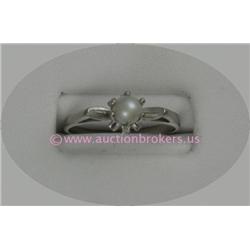 10 K WHITE GOLD LADIES GEMSTONE RING SET WITH ONE ROUND CULTURED PEARL APPROXIMATELY 4 MM. RING SIZE
