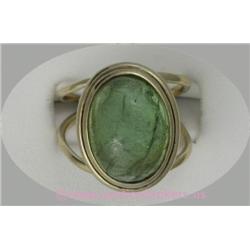 14 K YELLOW GOLD LADIES GEMSTONE RING SET WITH A GREEN TRANSLUCENT CABOCHON STONE. 6.2 GRAMS.