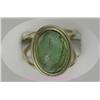 Image 1 : 14 K YELLOW GOLD LADIES GEMSTONE RING SET WITH A GREEN TRANSLUCENT CABOCHON STONE. 6.2 GRAMS.
