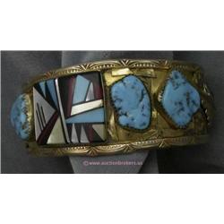 SIGNED HAND CRAFTED NATIVE AMERICAN PAWN 12 K GOLD OVER STERLING CUFF STYLE BRACELET SET WITH THREE 