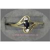 Image 1 : 14 K YELLOW GOLD LADIES GEMSTONE RING SET WITH ONE ONYX CABOCHON 3 X 5 MM AND ACCENTED WITH TWO ROUN