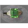 Image 1 : 14 K YELLOW GOLD LADIES GEMSTONE RING SET WITH AN EMERALD CUT GREEN STONE 7 X 10 MM. 3.9 GRAMS.