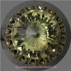 14 K YELLOW GOLD LADIES GEMSTONE RING SET WITH A MODIFIED LIGHT COLOR PERIDOT 14 MM. 8 GRAMS.