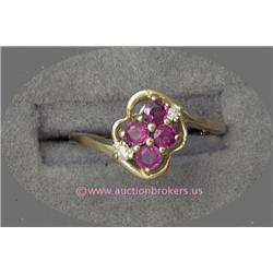 10 K YELLOW GOLD - P LADIES GEMSTONE RING SET WITH FOUR (4) ROUND BRILLIANT CUT  RUBIES .2 CT AND TW
