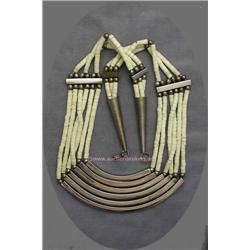 VINTAGE FAUX IVORY THREE STRAND OF GRADUATED LENGTH BEADS AND SILVER METAL SEPARATORS.